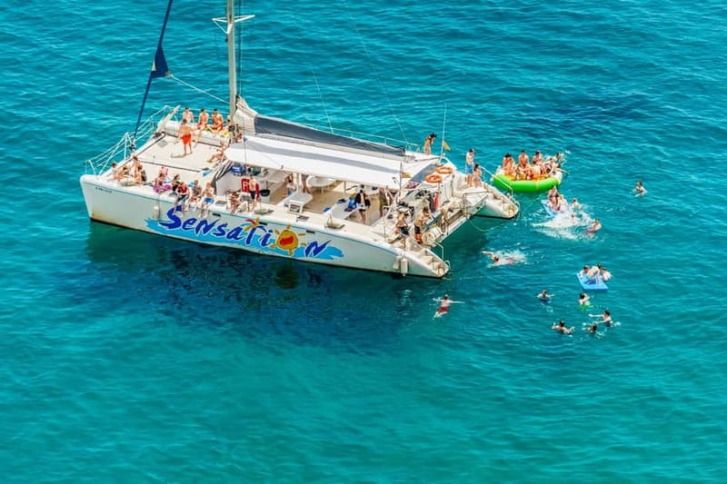 Barcelona: Catamaran Party Cruise with BBQ Meal - Meeting Point Reality Check: Find the Boat Without Stress