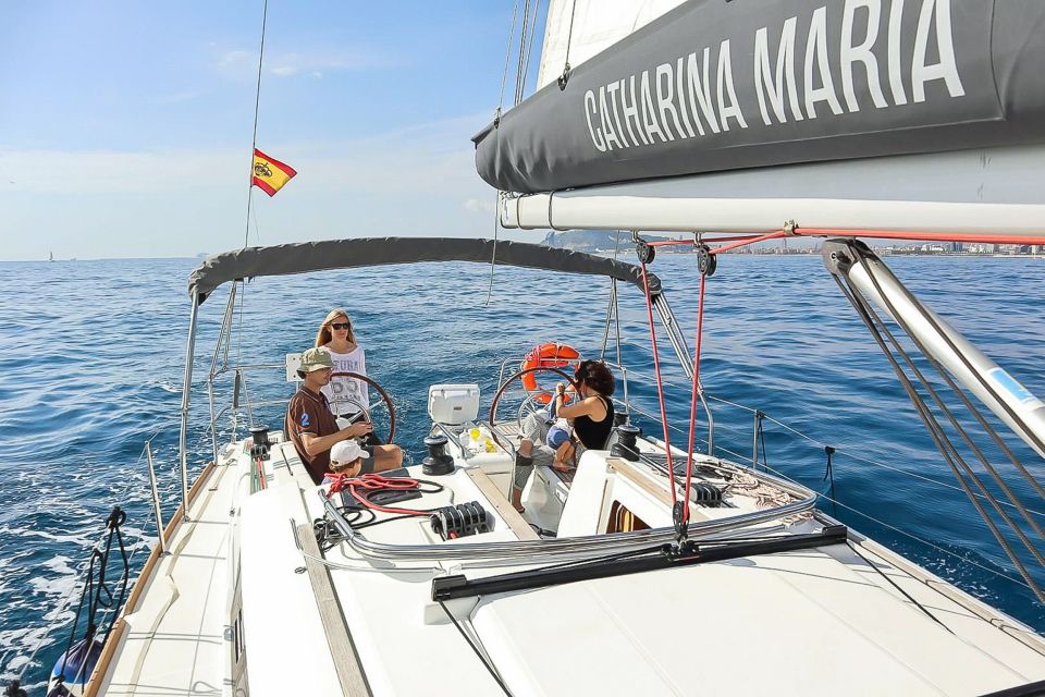 Barcelona: Coastline Boat Trip with Snacks and Cava - The swim stop: clear water, but conditions decide the plan