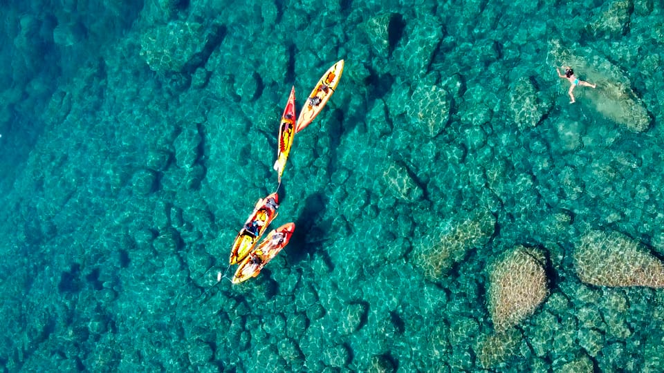 Barcelona: Costa Brava Kayak, Snorkel & Cliff Jump & Lunch - From La Bohème to Costa Brava: the day’s rhythm