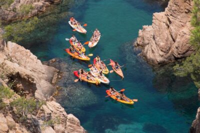Barcelona: Costa Brava Kayak, Snorkel & Cliff Jump & Lunch - Kayak the Costa Brava coast: coves, caves, and real time on the water