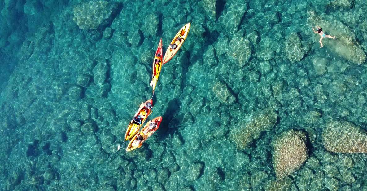 Barcelona: Costa Brava Kayak, Snorkel & Cliff Jump & Lunch - Low cliff jumps: controlled thrills near the coast
