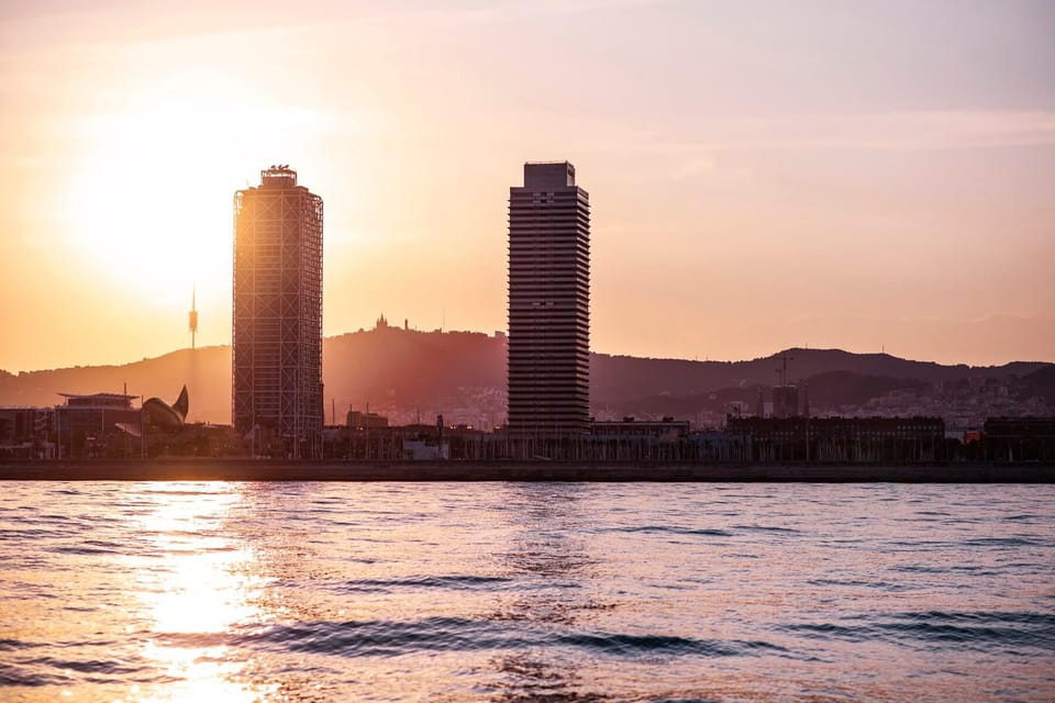 Barcelona: Daytime or Sunset Catamaran Cruise with Music - The route and views: port, coastline, and skyline photo moments