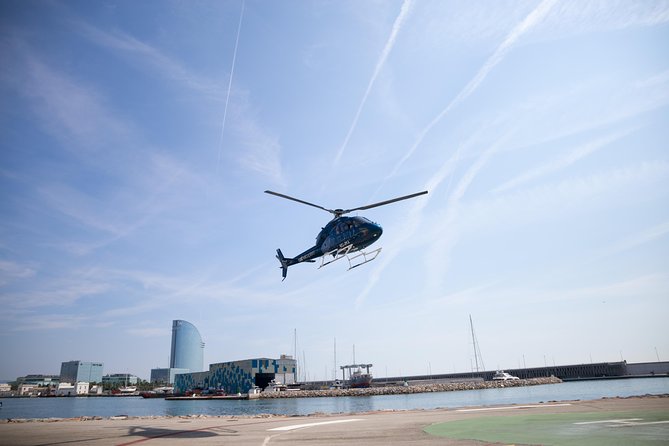 Barcelona Helicopter, Sailboat & Old Town Private Walking Tour - Port Vell to the heliport: the sea-to-air transition