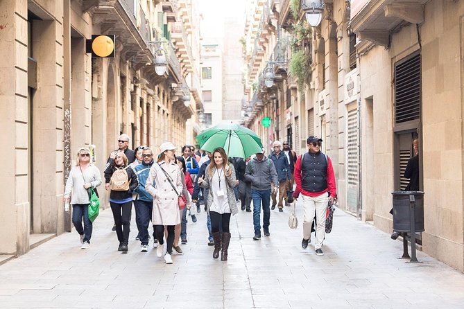 Barcelona Highlights Guided Tour with Monjuic Cable Car - The panoramic coach ride: Olympian views, port air, and Gaudí facades