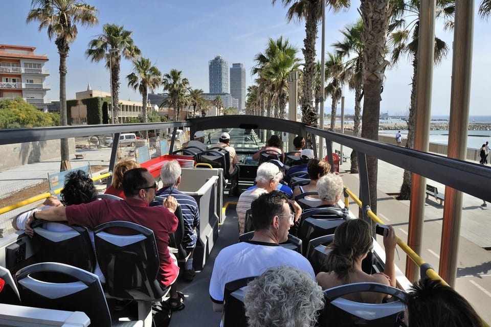 Barcelona: Hop-On Hop-Off Bus with Sailing Cruise - The West (Orange) Route: Stadium Views and Museum Detours