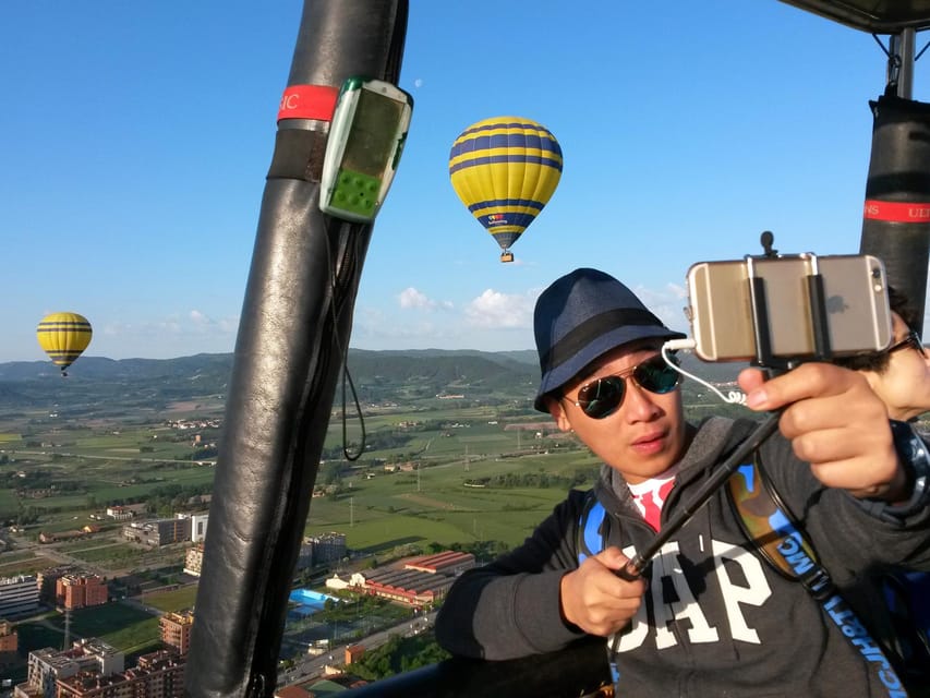 Barcelona: Hot Air Balloon Ride with Optional Transportation - After landing: pink Cava toast, light food, and your signed first-flight certificate