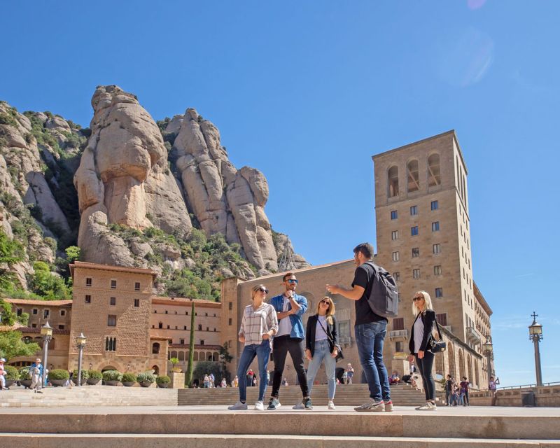 Barcelona: Montserrat, Girona & Costa Brava Guided Day Trip - Montserrat Abbey: the Moreneta experience and why the Massif matters