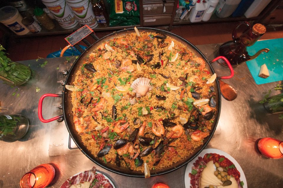 Barcelona: Paella Cooking Experience & Boqueria Market Tour - The Mercat de la Boqueria Walk: Seafood Shopping That Teaches You What Matters