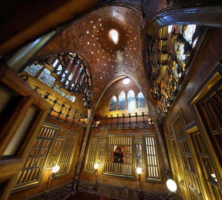 Barcelona: Palau Güell by Gaudí Entrance Ticket - The facade: stone, wrought iron, and mosaics you can read up close