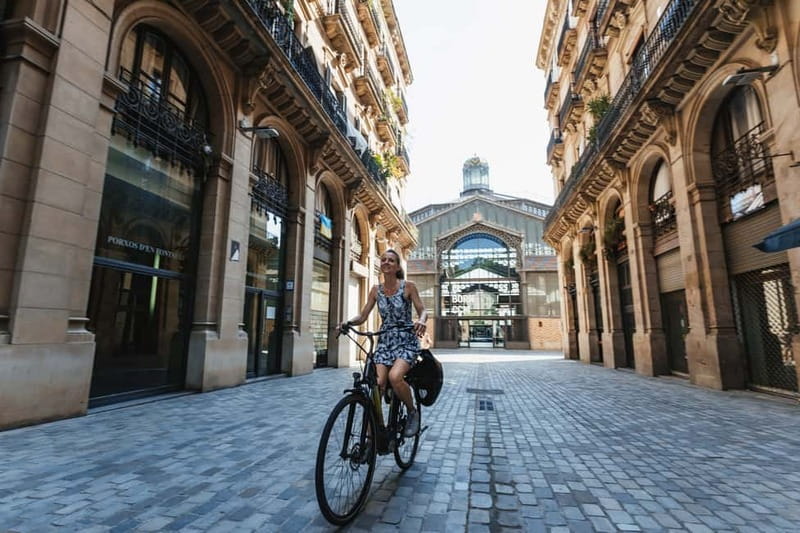 Barcelona: Sagrada Familia or Coastal City Sights by eBike - Vila Olímpica and the Port Olímpic marina: city meets coastline