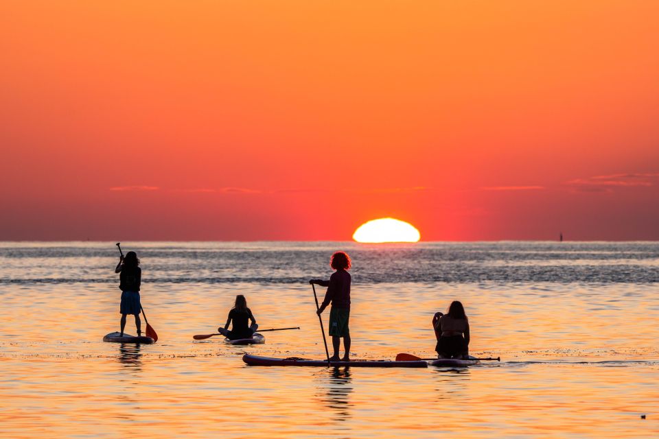 Barcelona: Sunrise Paddleboarding with Instructor and Photos - Sunrise and the Photo Stop: Getting the Shots Without Missing the Moment
