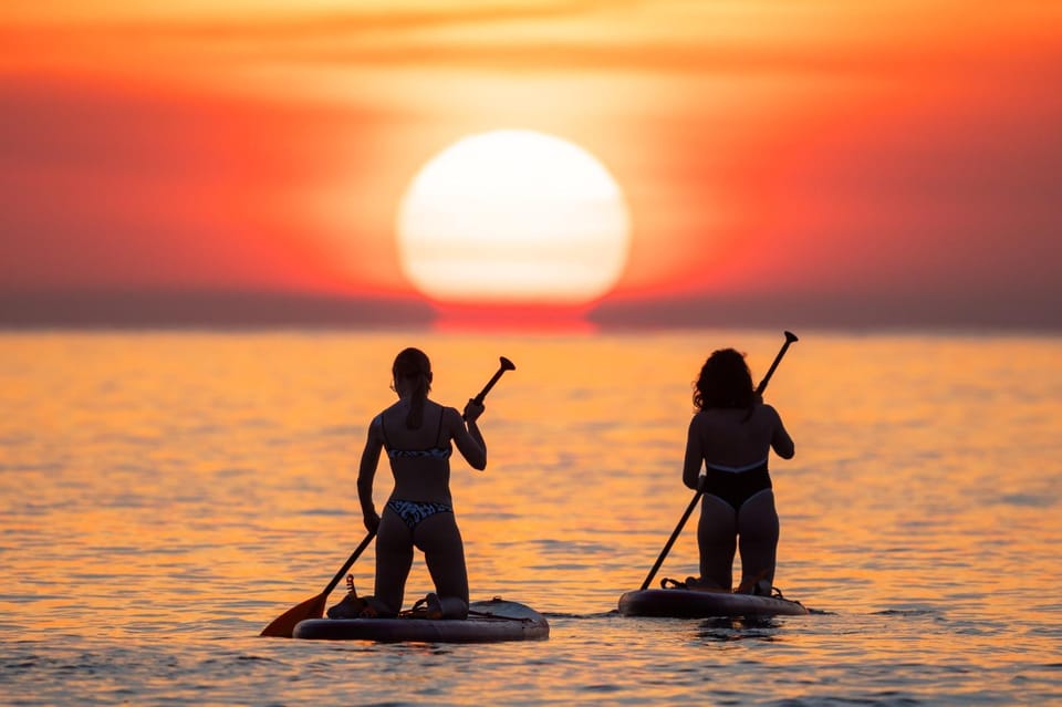 Barcelona: Sunrise Paddleboarding with Instructor and Photos - Who Should Book This Barcelona SUP Sunrise Trip