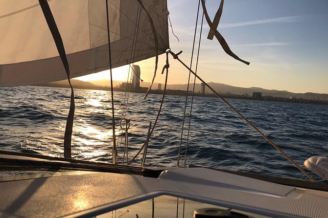 Barcelona Sunset Cruise with Light Snacks and Open Bar - The first leg along the waterfront: Port Vell views at eye level