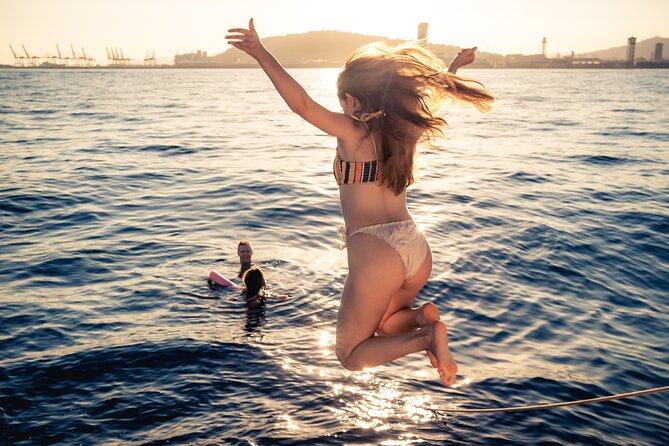 Barcelona Sunset Cruise with Light Snacks and Open Bar - Heading out for sunset: when the skyline looks totally different