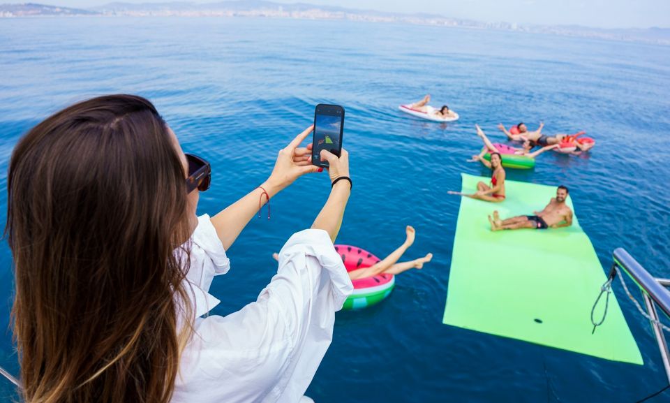 Barcelona: Sunset or Day Catamaran Cruise with Tapa & Drink - Your first stop is the welcome: tapa and a complimentary drink