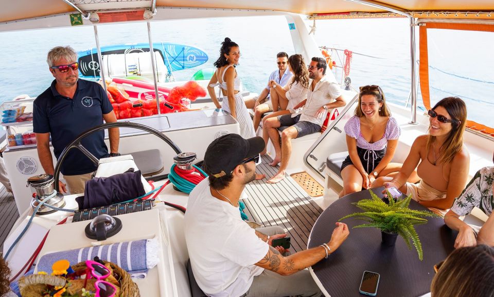 Barcelona: Sunset or Day Catamaran Cruise with Tapa & Drink - Day cruise option: the swim stop and how inflatables fit in