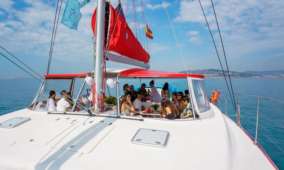 Barcelona: Sunset or Day Catamaran Cruise with Tapa & Drink - What the crew does well: safety, energy, and keeping the group together