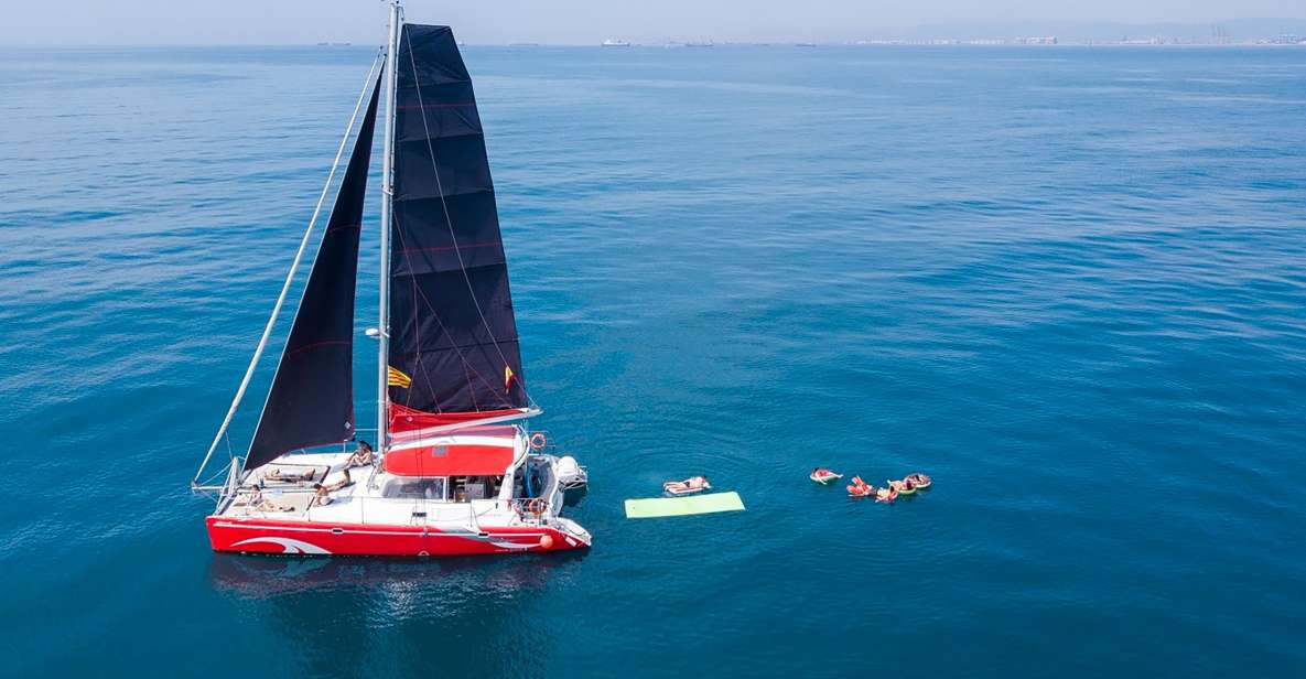 Barcelona: Sunset or Day Catamaran Cruise with Tapa & Drink - The catamaran itself: stable, spacious, and made for lounging