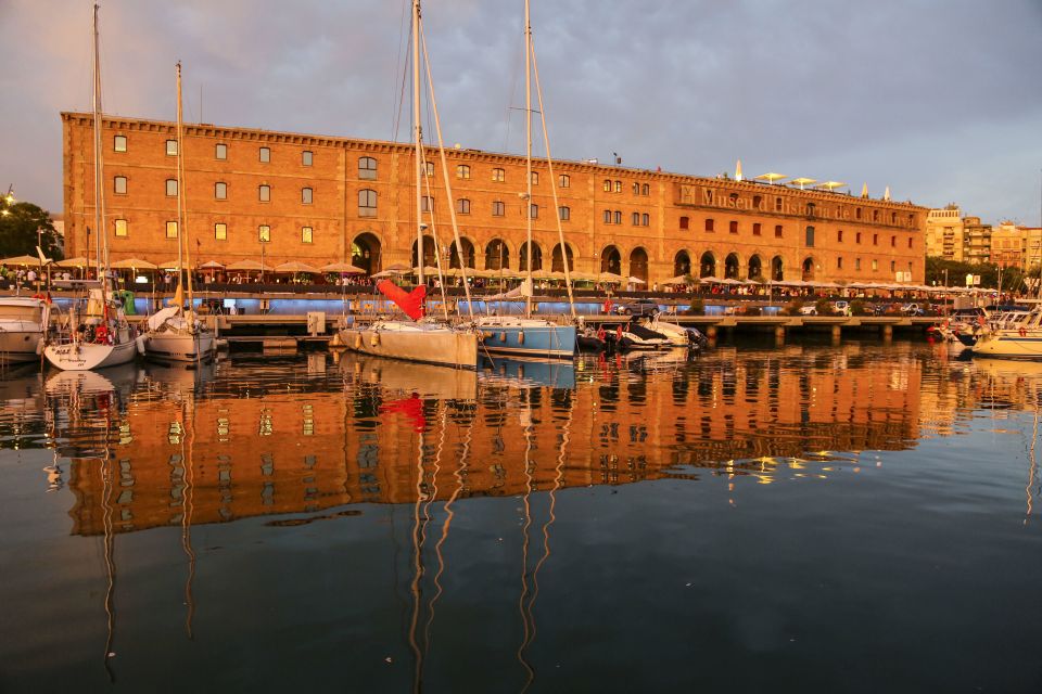 Barcelona: Unique Sunset Sailing Tour with Tapas & Open Bar - Steering the boat versus relaxing: how the onboard vibe works