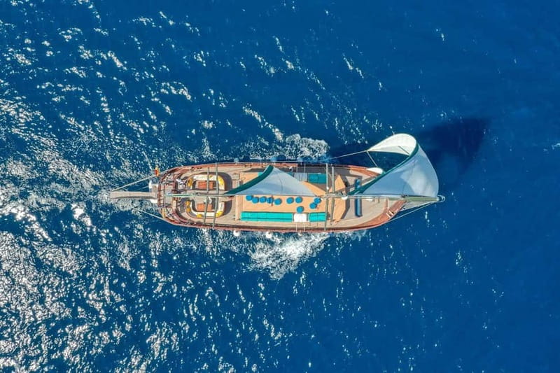 Barcelona: Wooden Boat Sailing with Tapa and Welcome Drink - The Boat: Classic Wooden Sailing Experience With Modern Comforts