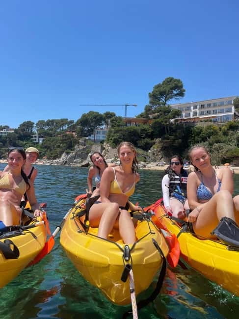 From Barcelona: Costa Brava Kayak & Snorkel Tour with Picnic - The kayaking day: caves, coves, and volcanic cliffs above turquoise water