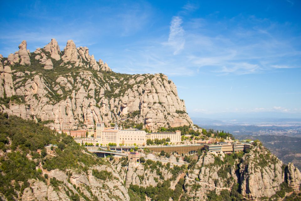 From Barcelona: Half-Day Montserrat Experience - Meeting in Barcelona and the Smooth Ride Up in an Air-Conditioned Vehicle
