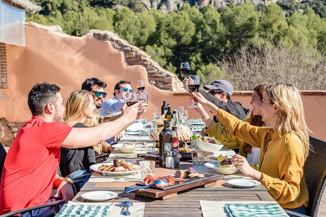 Montserrat Lunch & Wine at Farmhouse Small Group from Barcelona - Farmers market time and the Black Madonna choice