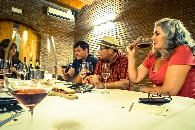 Montserrat & Winery Visit Tour with Traditional Farmhouse Lunch - The Penedès shift: vine walks and cellar tour energy