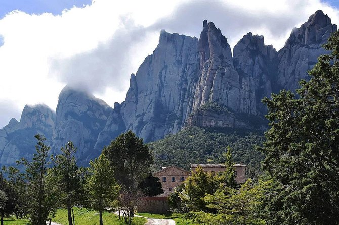 Montserrat,Vineyard, Wine Tasting Small Group Tour & Hotel Pickup - Moving to Penedès: from monastery spirituality to cava-country views