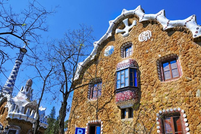 Park Guell Guided Tour with Skip the Line Tickets - The Wave-Shaped Iron Gate and Casa Larrard Gardens